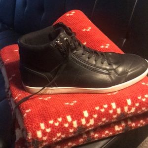 Guess is the brand, these are dress/sneakers.